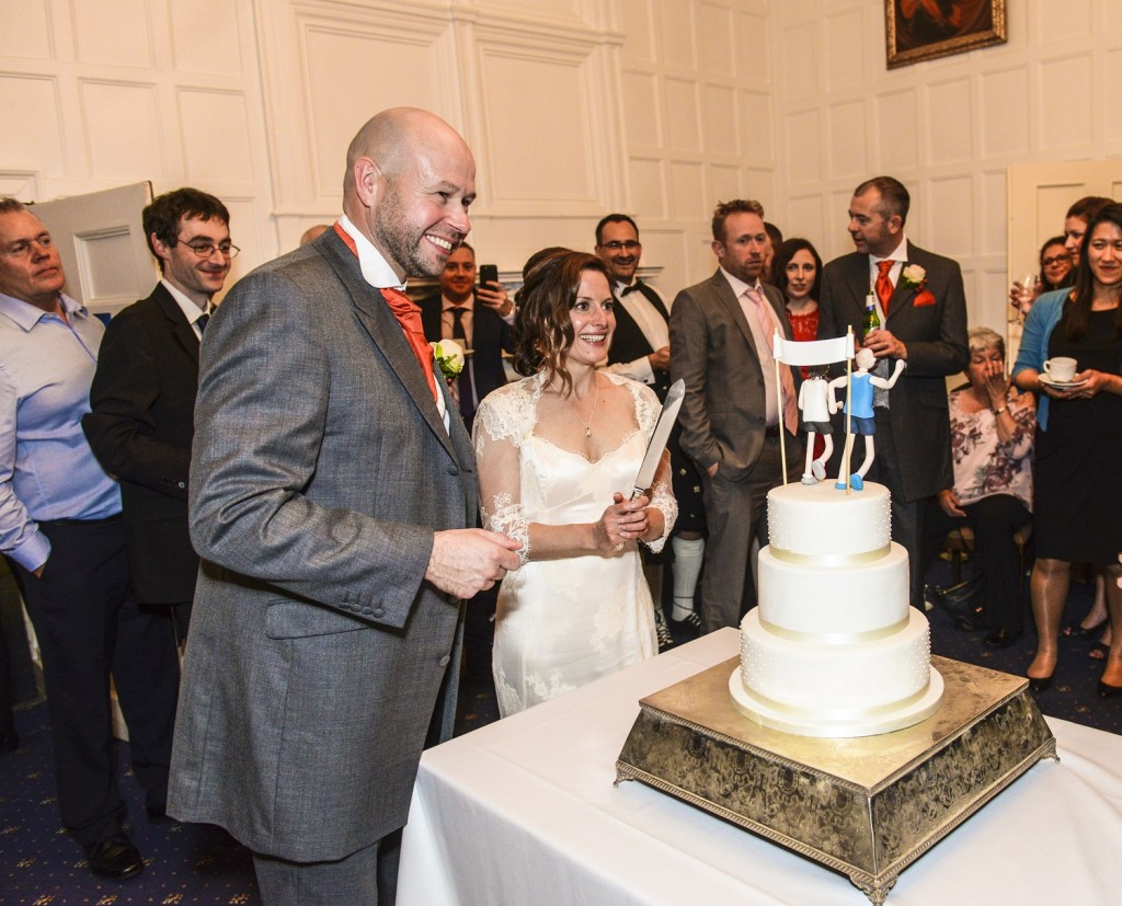 cutting the cake at Bisham Abbey
